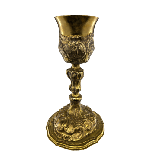 A sacred vessel used in religious ceremonies, especially the Christian Eucharist. Usually made from precious materials such as gold or silver, it is used to hold wine which is believed to become the blood of Christ during the Mass.